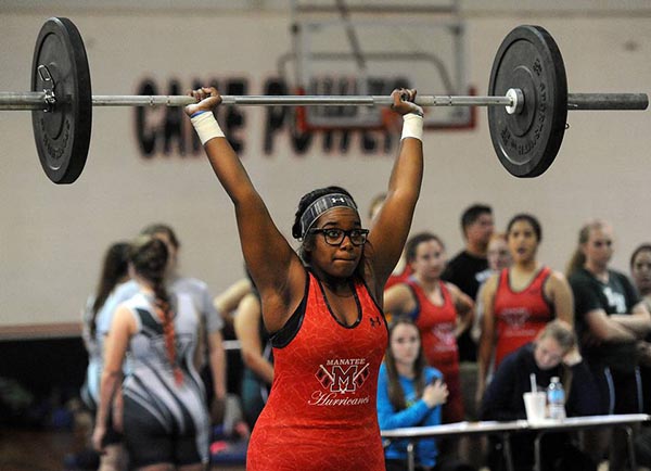 Manatee High's Monica Lowe makes her first clean and jerk attempt at the district girls weightlifting meet at Manatee Wednesday. Read more here: http://www.bradenton.com/latest-news/article54624595.html#storylink=cpy