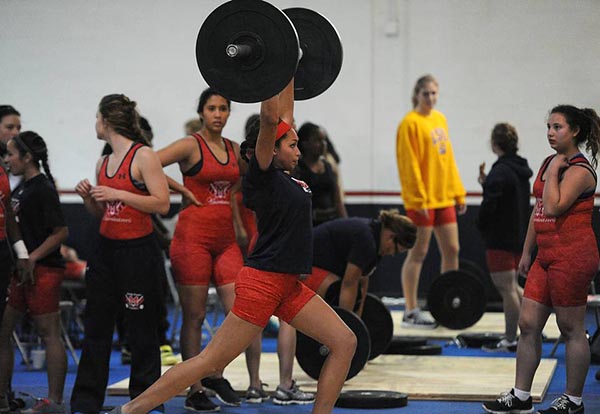 Girls warm up their clean and jerk at the district girls weightlifting meet at Manatee Wednesday. Read more here: http://www.bradenton.com/latest-news/article54624595.html#storylink=cpy