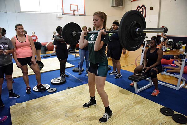 Lakewood Ranch's Maddie Koczersut warms up her clean and jerk at the district girls weightlifting meet at Manatee Wednesday. Read more here: http://www.bradenton.com/latest-news/article54624595.html#storylink=cpy