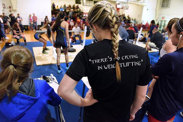 Palmetto's Morgan Payne, with braid, watches her fellow athletes compete at the district girls weightlifting meet at Manatee Wednesday. Read more here: http://www.bradenton.com/latest-news/article54624595.html#storylink=cpy