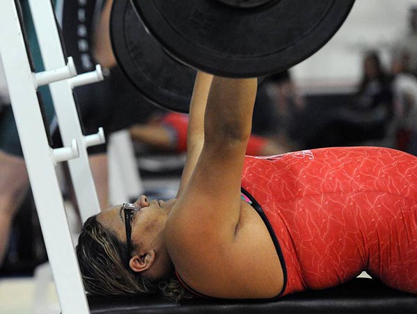 Manatee High's Natasha Walsh completes a 125 lb bench press at the district girls weightlifting meet at Manatee Wednesday. Read more here: http://www.bradenton.com/latest-news/article54624595.html#storylink=cpy