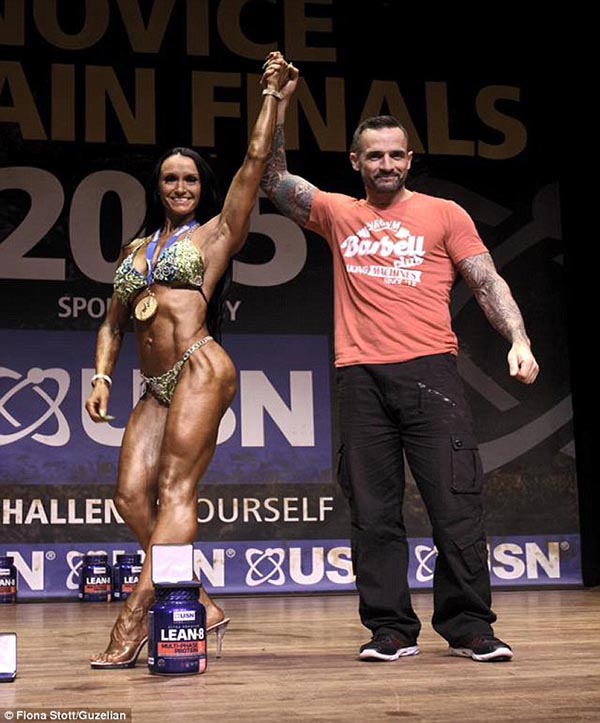 With partner Nick after winning the NABBA's Miss Great Britain Athletic Figure 2015 Read more: http://www.dailymail.co.uk/femail/article-3345696/Eleven-stone-mother-two-transformed-champion-bodybuilder-just-10-MONTHS-partner-sent-healthy-eating-plan.html#ixzz3tNkaiBnW Follow us: @MailOnline on Twitter | DailyMail on Facebook