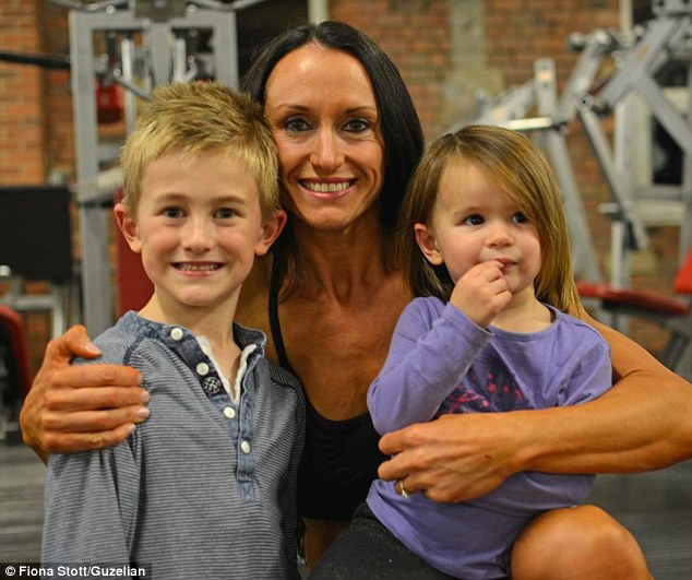 Fiona with her two children, seven-year-old Ryden and two-year-old Dori. She said: 'My children have learned to understand how important healthy eating is and enjoy a good balanced diet. My daughter tells everyone that mummy loves chicken and broccoli' Read more: http://www.dailymail.co.uk/femail/article-3345696/Eleven-stone-mother-two-transformed-champion-bodybuilder-just-10-MONTHS-partner-sent-healthy-eating-plan.html#ixzz3tNk2XBfL Follow us: @MailOnline on Twitter | DailyMail on Facebook