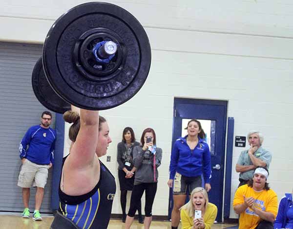 Charlotte's Loni Carmello sets a personal best in the clean and jerk lifting 210 points to win the 199-pound weight class at the Class 2A-Region 8 title Wednesday afternoon at Wally Keller Gymnasium in Punta Gorda. STAFF PHOTO / DENNIS MAFFEZZOLI