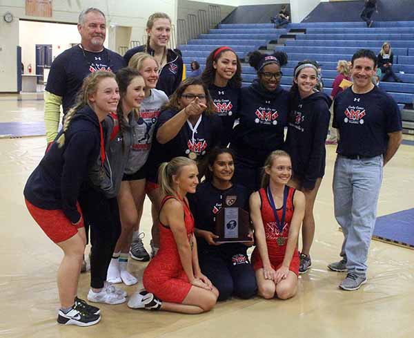 The Manatee High girls weightlifting team poses with the runner-up trophy after finishing tied for second with Land O'Lakes Sunlake High in the Class 2A-Region 8 title Wednesday afternoon at Wally Keller Gymnasium in Punta Gorda. STAFF PHOTO / DENNIS MAFFEZZOLI
