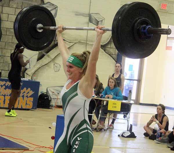 Natalie Deto of Venice lifts 165 pounds in the clean and jerk to win the 119-pound weight class at the Class 2A-Region 8 title Wednesday afternoon at Wally Keller Gymnasium in Punta Gorda. STAFF PHOTO / DENNIS MAFFEZZOLI